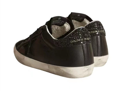 GOLDEN GOOSE Super-Star in black nappa with black star and glitter heel tab