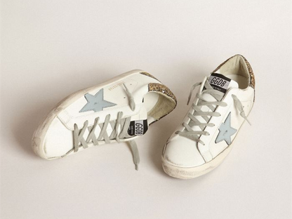 GOLDEN GOOSE Super-Star sneakers with light blue leather star and gold glitter crocodile-print heel tab