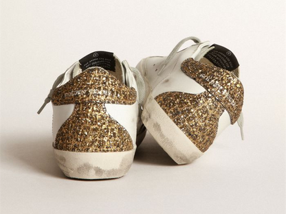 GOLDEN GOOSE Super-Star sneakers with light blue leather star and gold glitter crocodile-print heel tab
