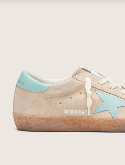 Golden Goose Super-Star in beige suede with aqua-green star